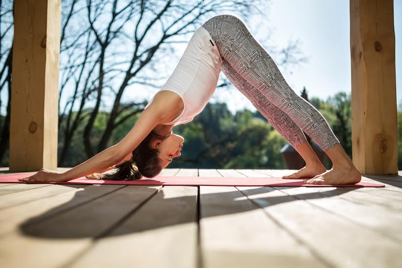 Your downward dog may do wonders for your digestive health